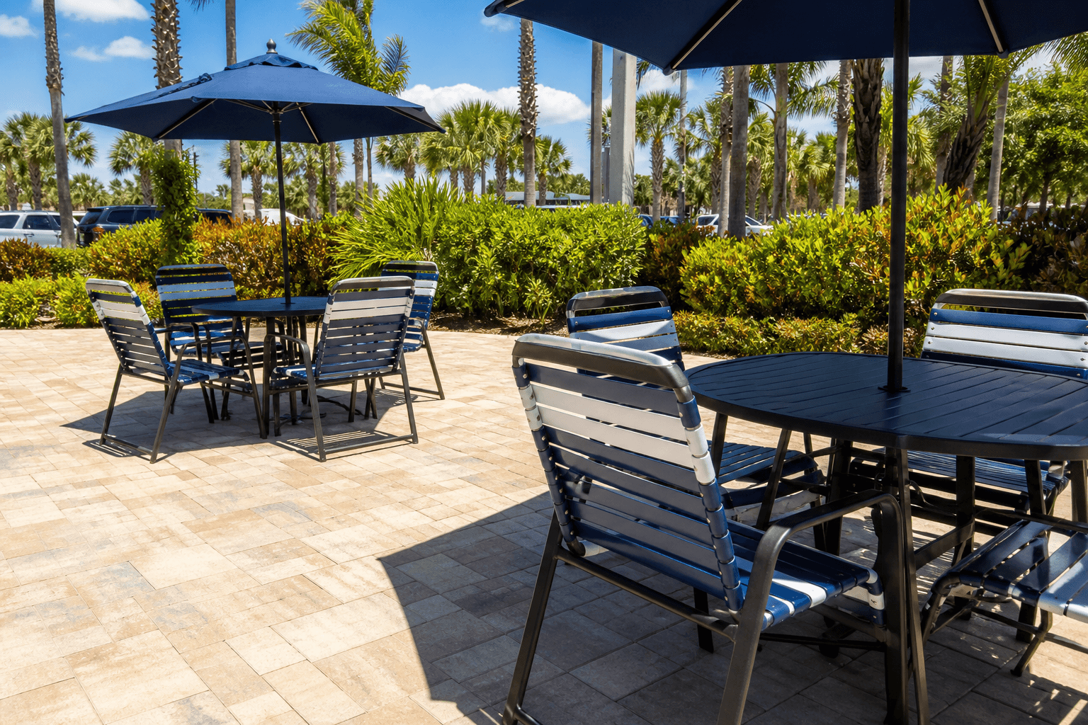 Cafe patio with stylish, durable commercial chair re-strapping in a Florida setting